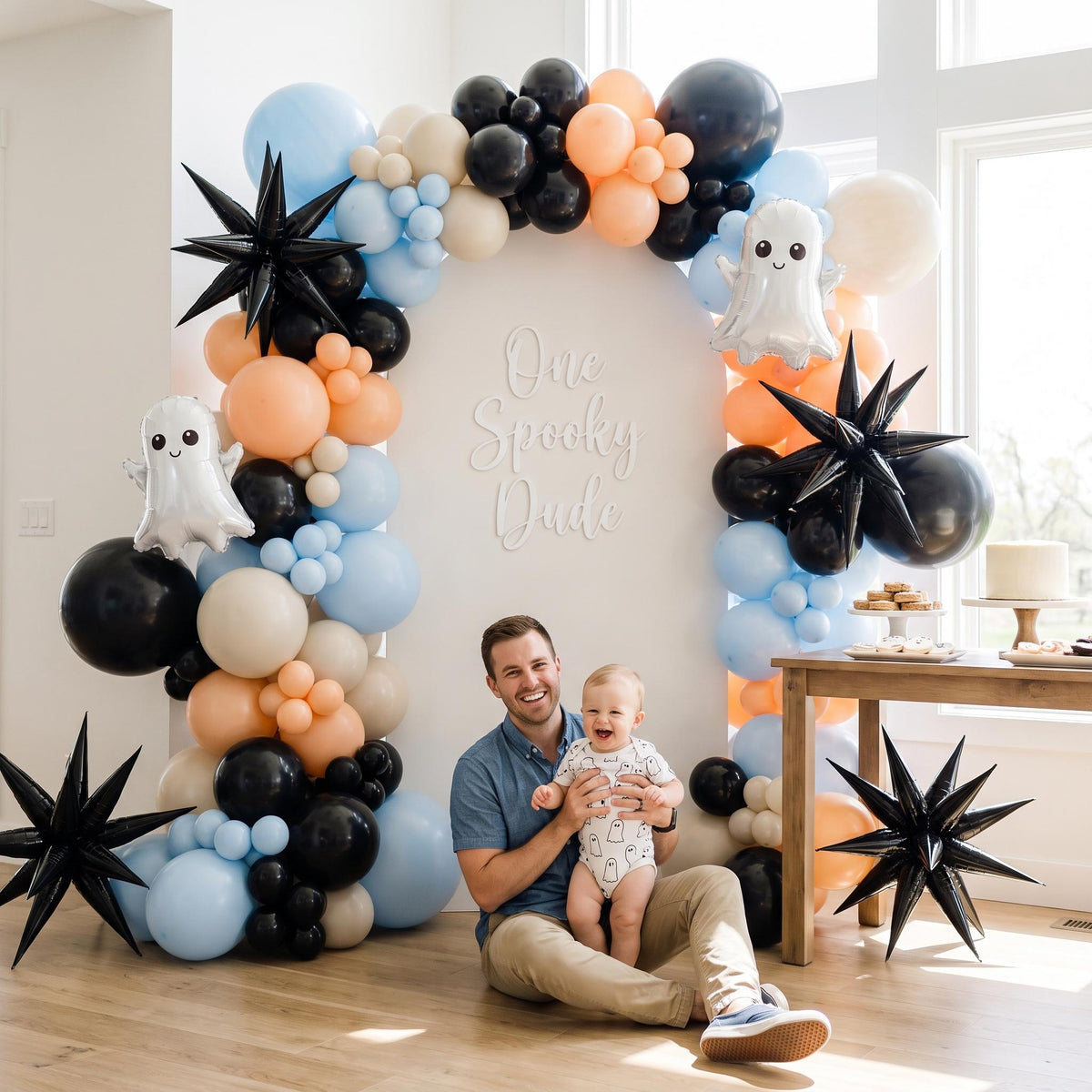 One Spooky Dude balloon garland styled at a party