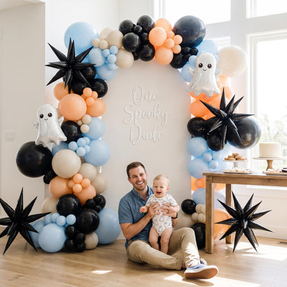One Spooky Dude balloon garland styled at a party