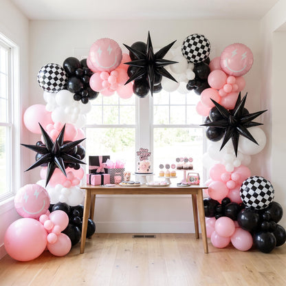 One Happy Girl (Pink) balloon garland installed on a wall at home
