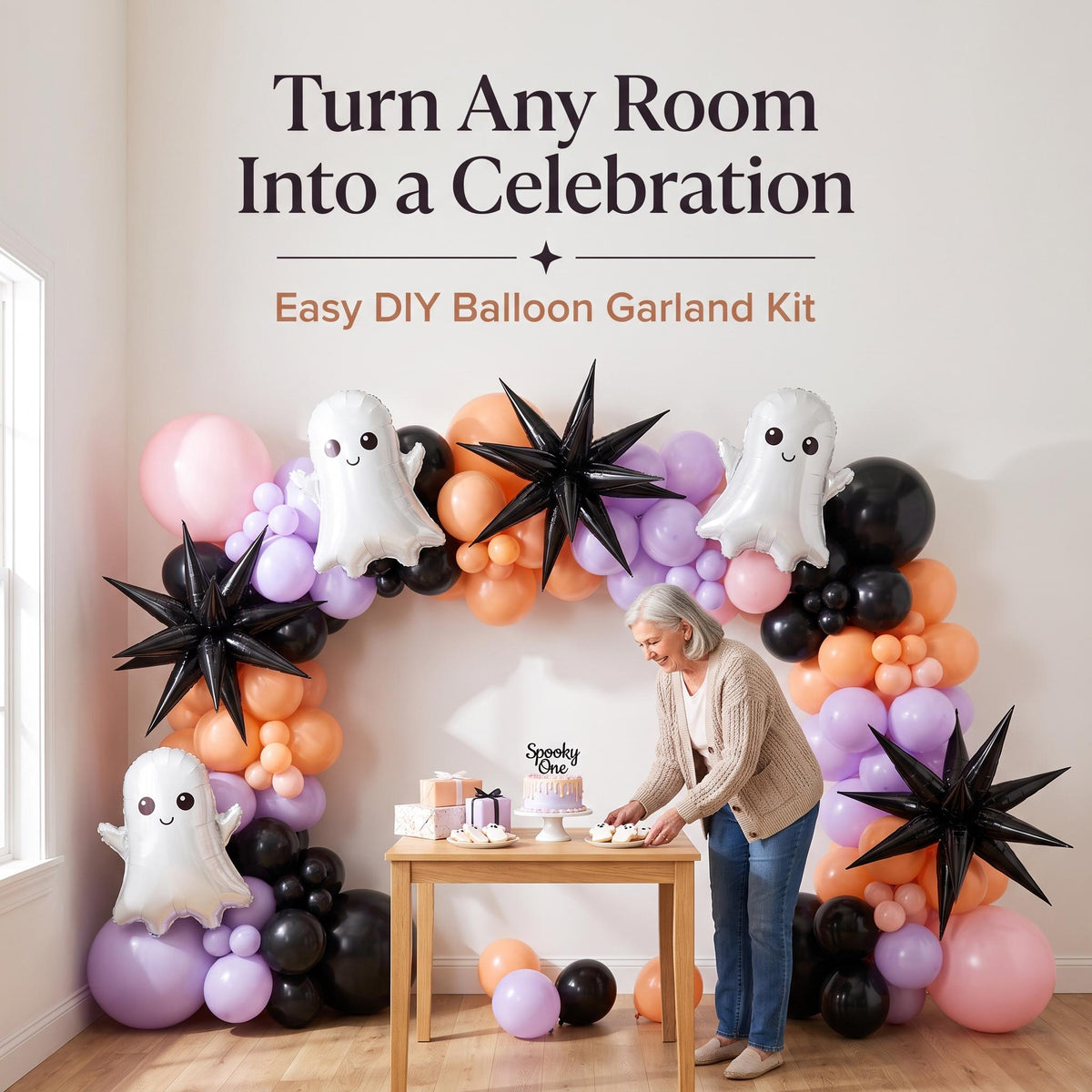 Spooky One balloon garland party setup