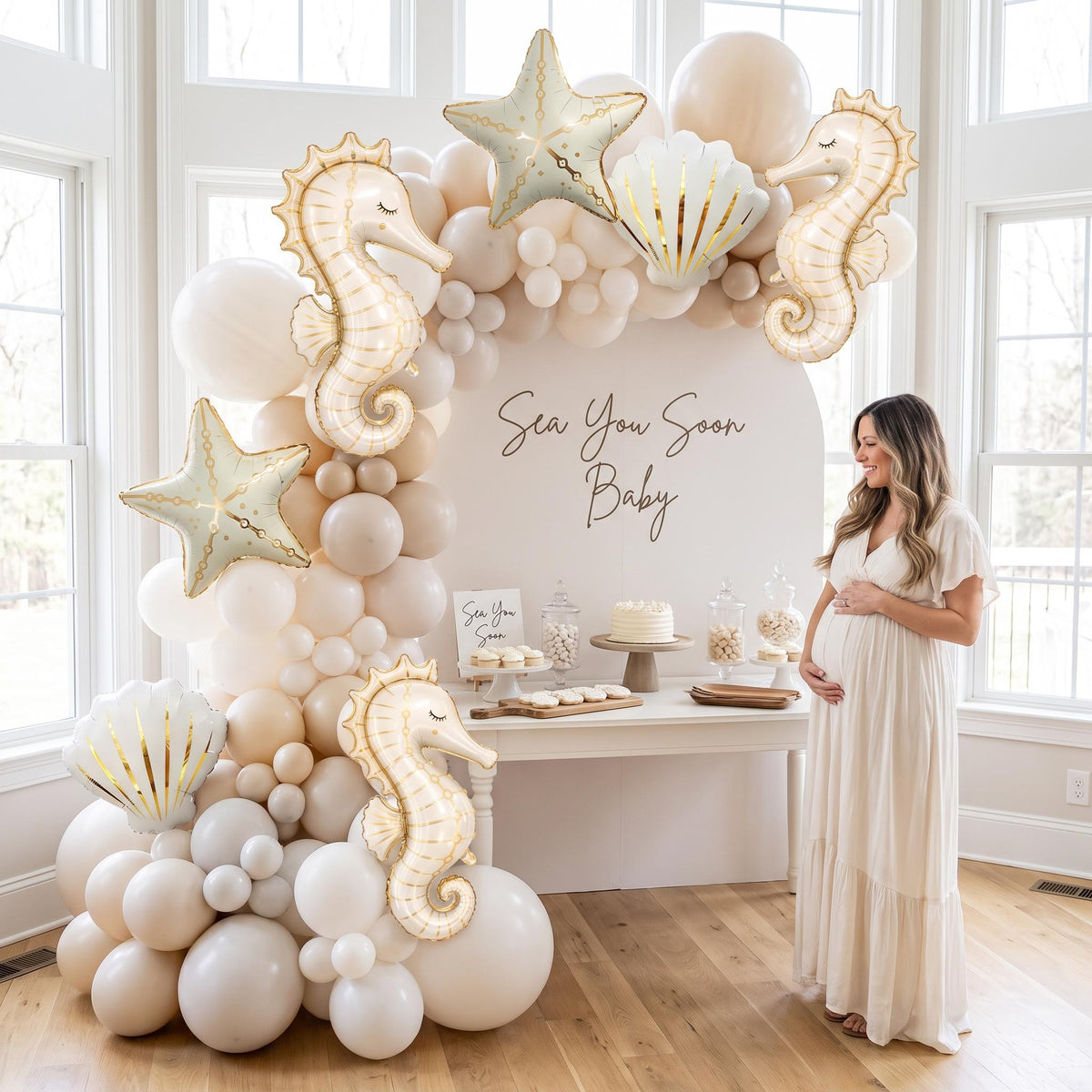 Sea You Soon (Neutral) balloon garland styled at a party