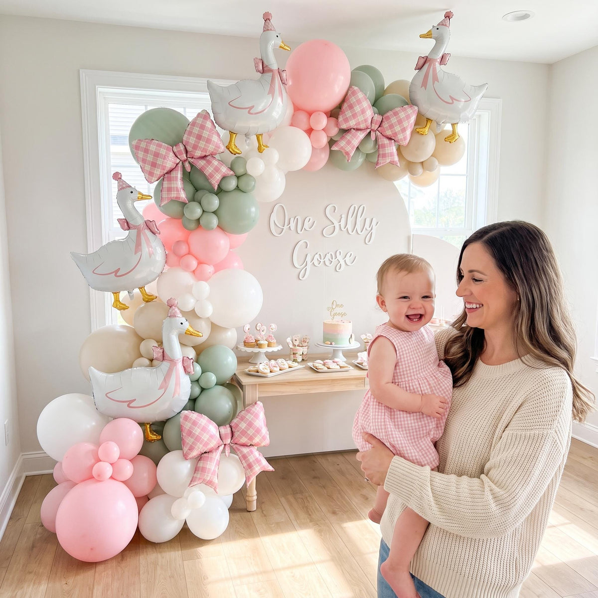 One Silly Goose (Pink) balloon garland styled at a party