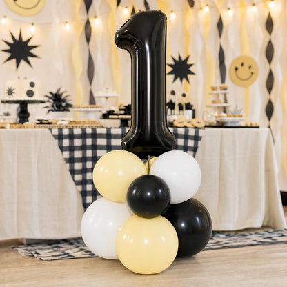 One Happy Dude (Yellow) balloon tower: 8 latex balloons topped with a Yellow Smiley foil