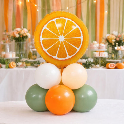 A Little Cutie On The Way balloon tower: 8 latex balloons topped with an Orange Slice foil