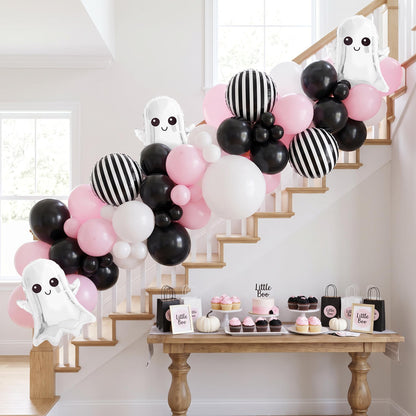 Little Boo's First Halloween balloon garland installed on a wall at home