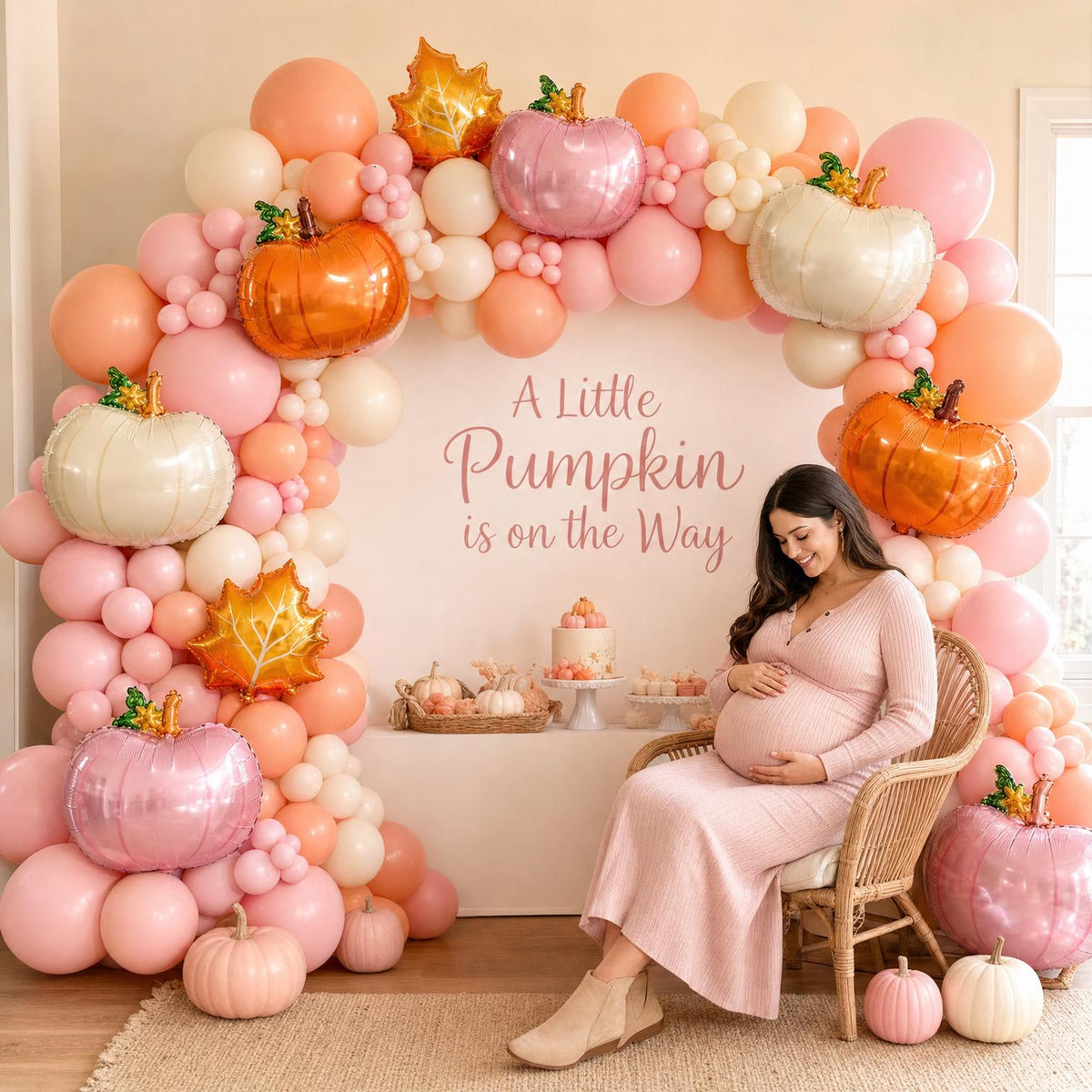 A Little Pumpkin Is On The Way balloon garland styled at a party