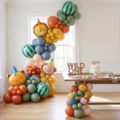 Boho Party Animals balloon garland installed on a wall at home
