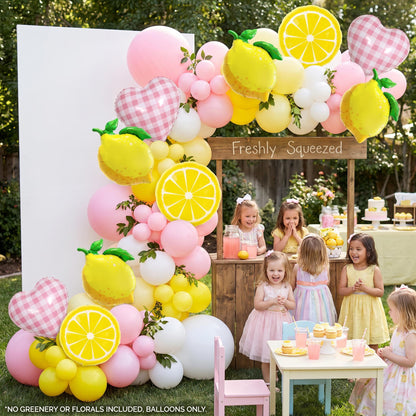 Freshly Squeezed balloon garland styled at a party