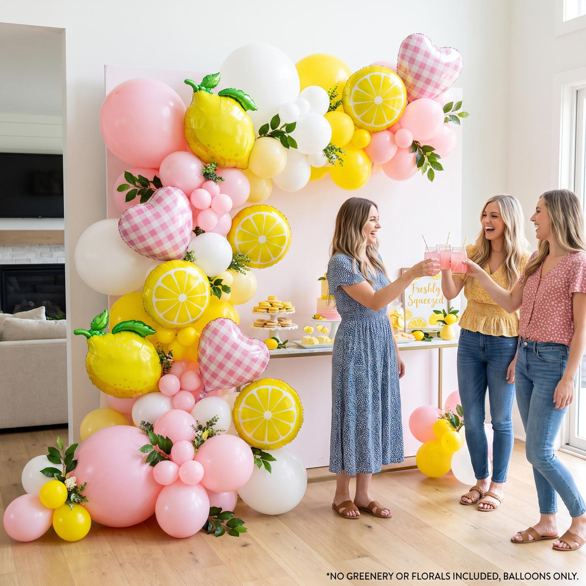 Freshly Squeezed balloon garland styled at a party
