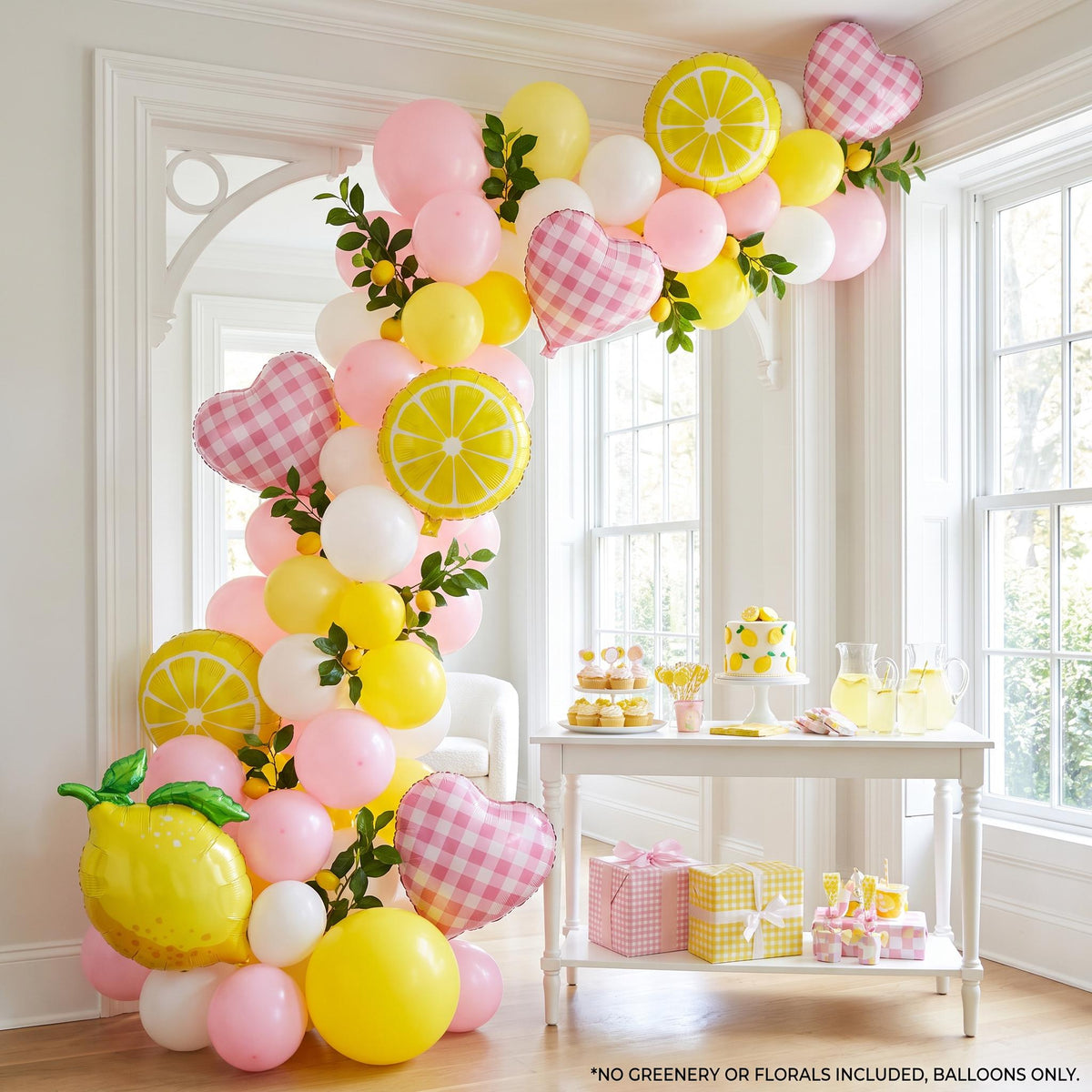Freshly Squeezed balloon garland installed on a wall at home
