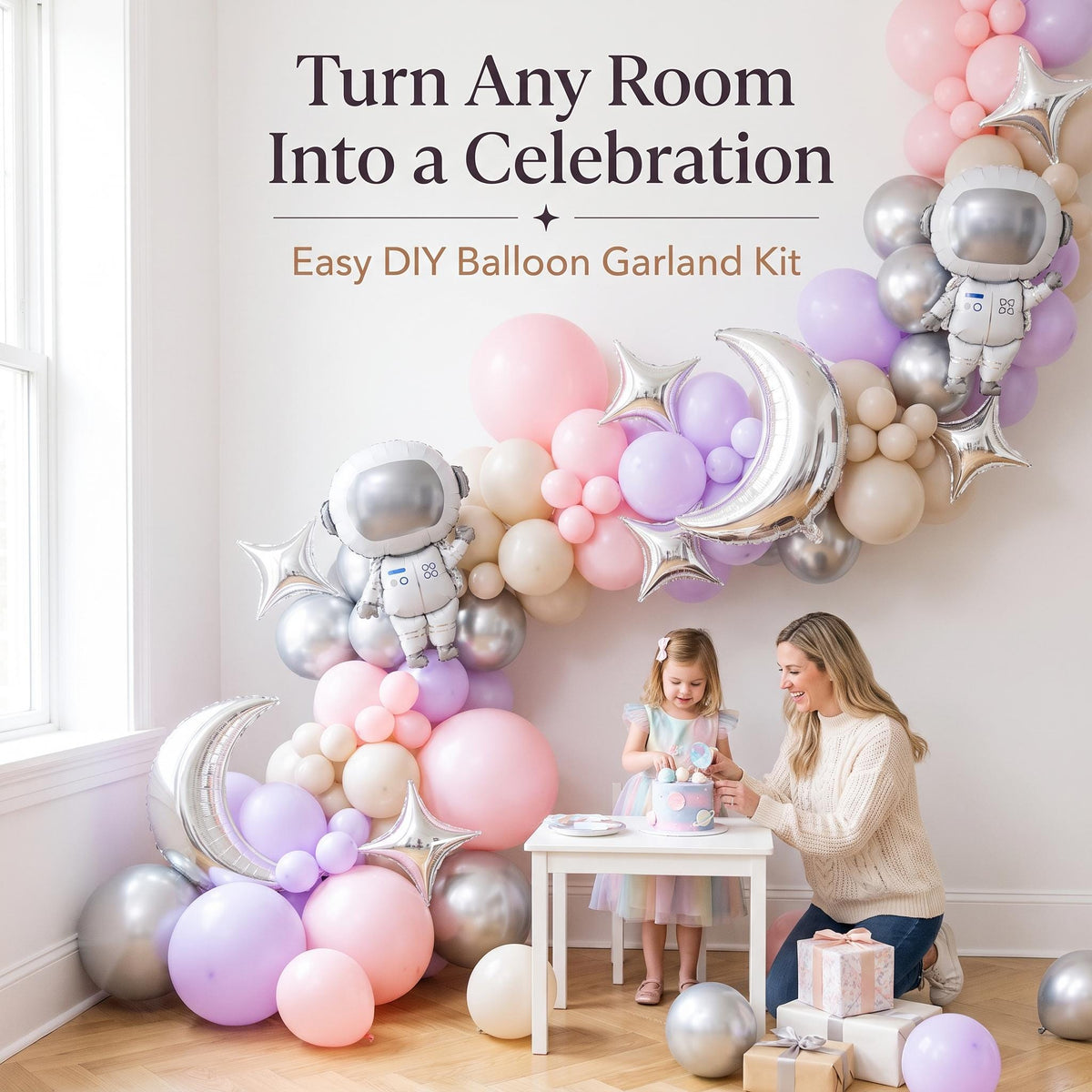 Pink Space Astronaut balloon garland party setup