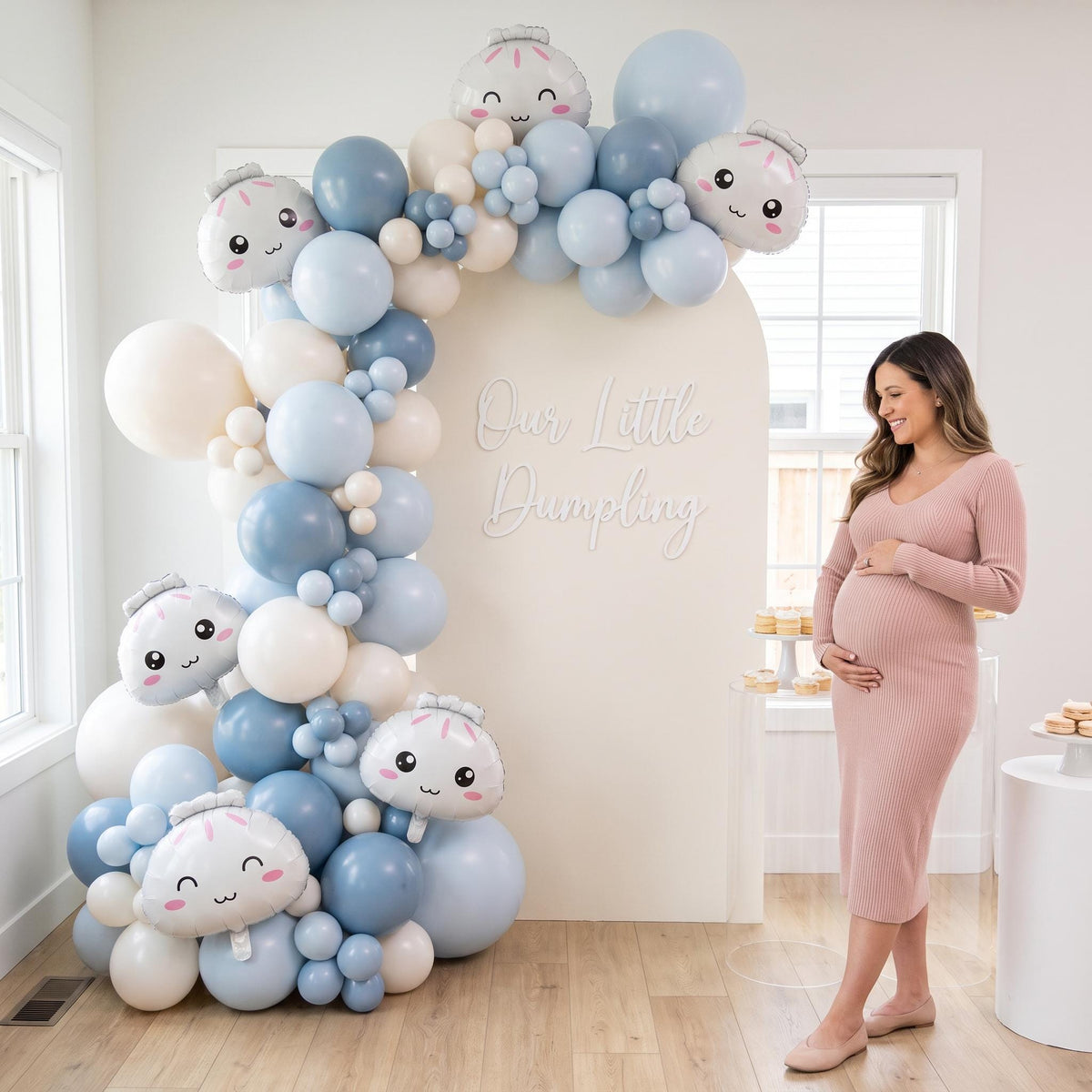 Our Little Dumpling (Blue) balloon garland styled at a party