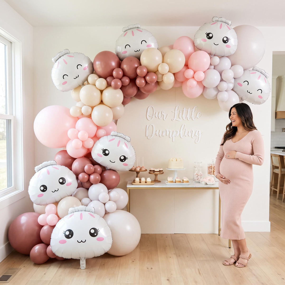 Our Little Dumpling balloon garland styled at a party