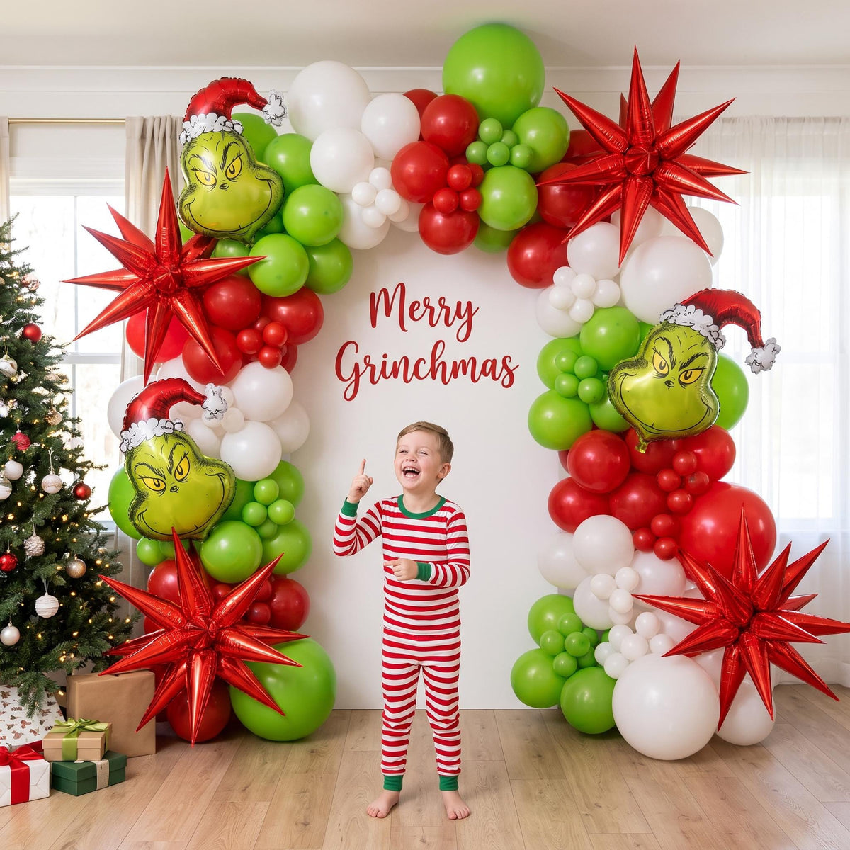 Grinchmas Red & White (Licensed) balloon garland styled at a party