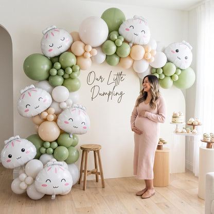 Our Little Dumpling (Matcha Cream) balloon garland styled at a party
