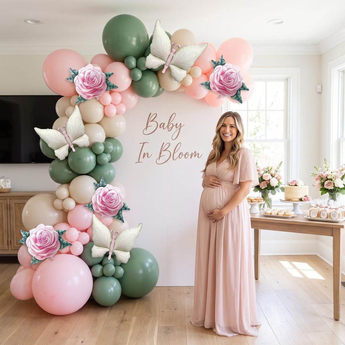 Baby In Bloom balloon garland styled at a party