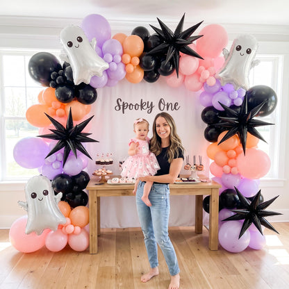 Spooky One balloon garland styled at a party