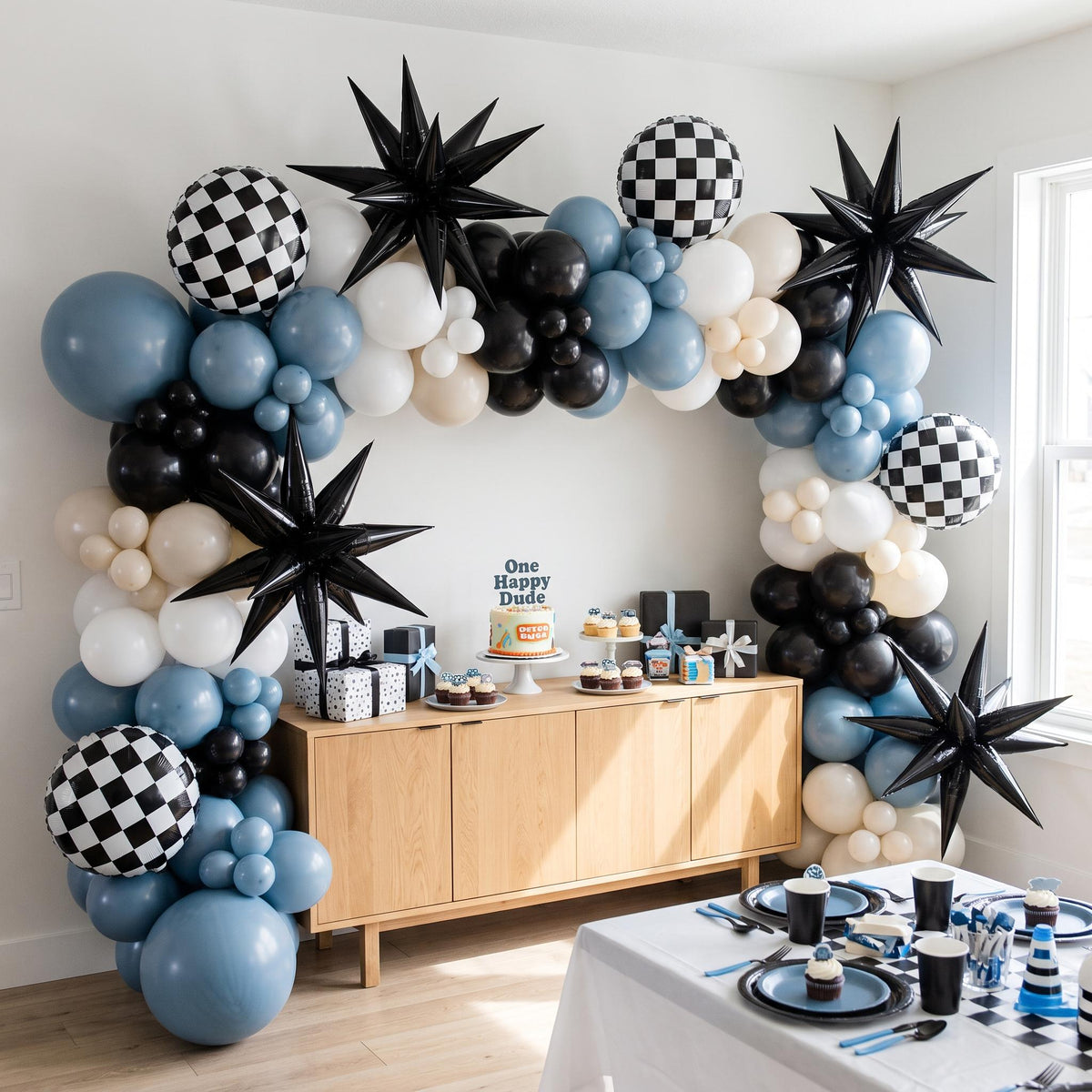 One Happy Dude (Blue Slate) balloon garland installed on a wall at home