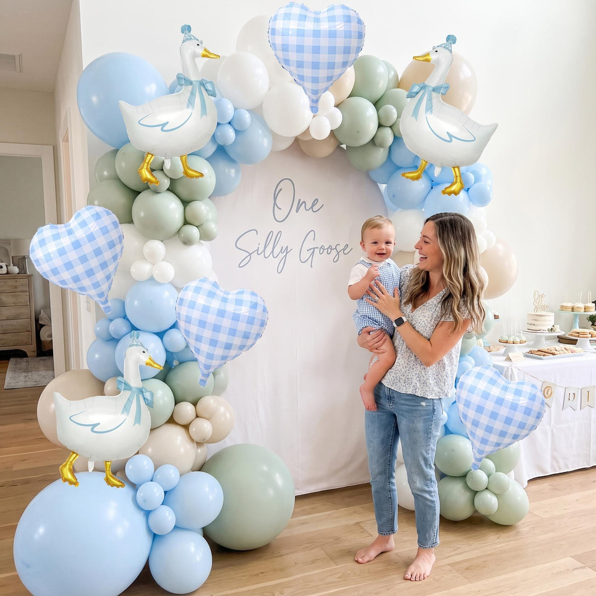 One Silly Goose (Blue) balloon garland styled at a party