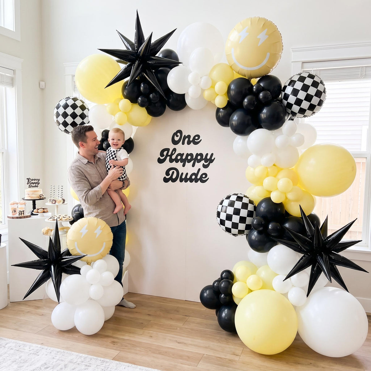 One Happy Dude (Yellow) balloon garland styled at a party