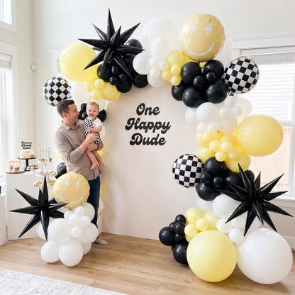 One Happy Dude (Yellow) balloon garland styled at a party