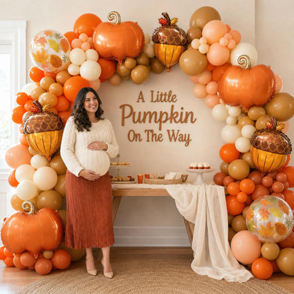 A Little Pumpkin On The Way balloon garland styled at a party