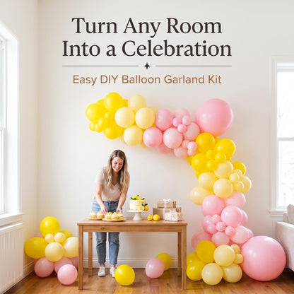 A Little Lemon balloon garland party setup